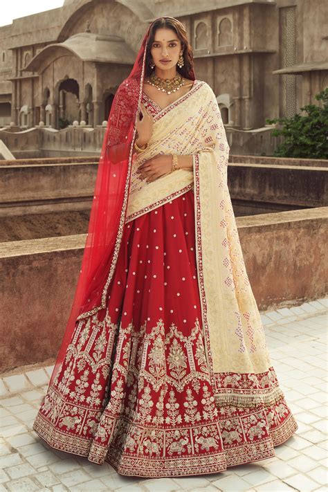 Buy Red Silk Embroidered Cutdana V Neck And Pearl Bridal Lehenga Set