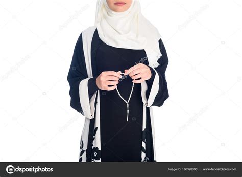 Muslim woman with prayer beads — Stock Photo © IgorVetushko #166328390