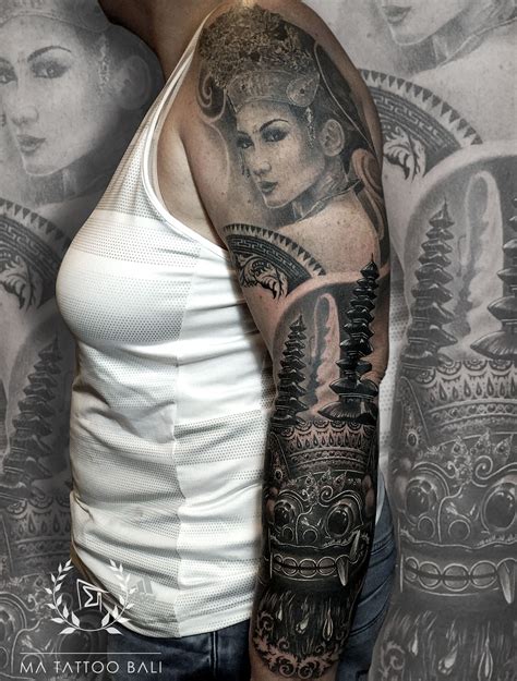 a woman with a tattoo on her arm