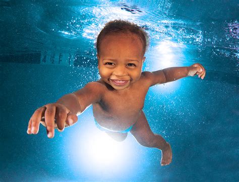 Black Baby Swimming Underwater