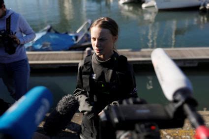 Greta Thunberg says sailing voyage ‘energized’ her climate fight | PBS News