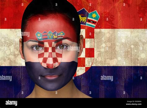 Beautiful football fan in face paint Stock Photo - Alamy