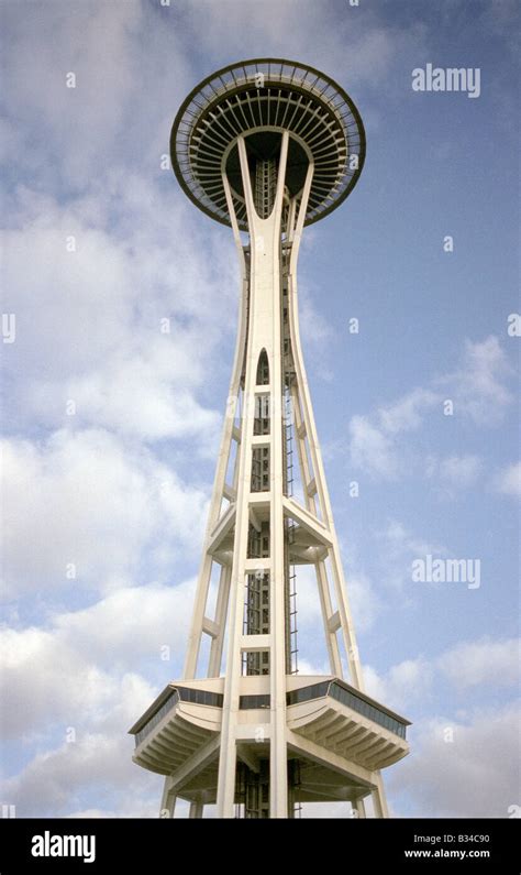 Seattle Space Needle And Big Pillow Like Clouds With Blue Sky Stock