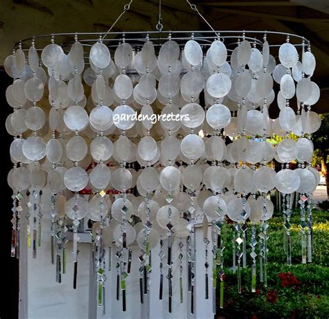 Pin On Lamparas Solar Lights Capiz Shell Windchimes