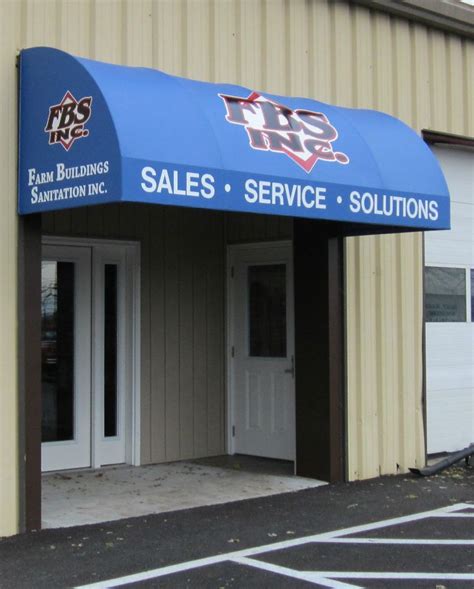 Vinyl Awning With Colorful Logo Applied To Front And Side Edges