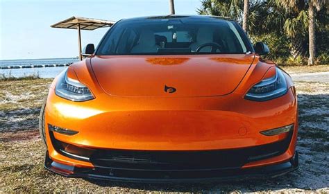 This Orange Wrapped Tesla Model 3 Looks Alluring Tesla Model Tesla