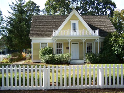 Small House With White Picket Fence