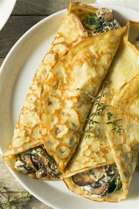 Savory Homemade Mushroom And Spinach Crepes Stock Photo Image Of