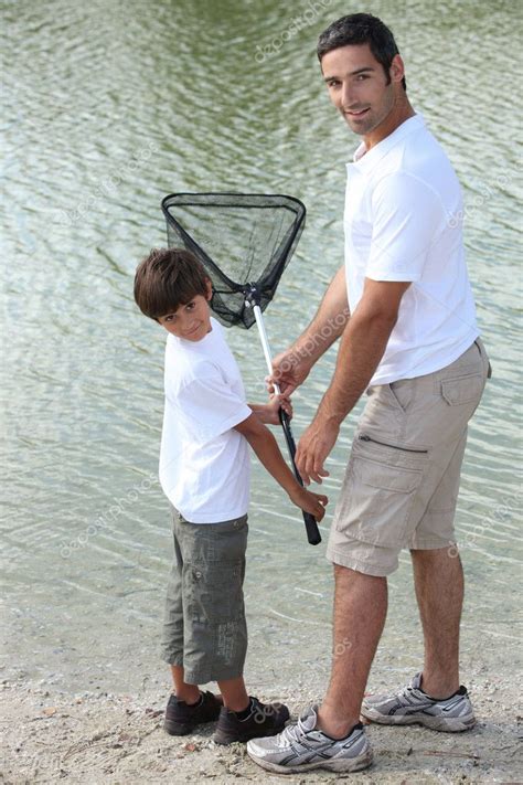 Father and son fishing — Stock Photo © photography33 #8176736