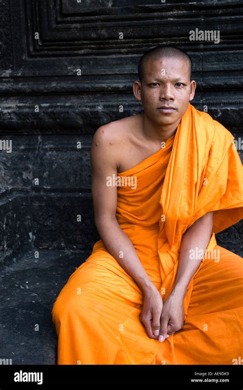 Stock Photo Of A Novice Monk At The Ancient Temple Of Angkor Wat In