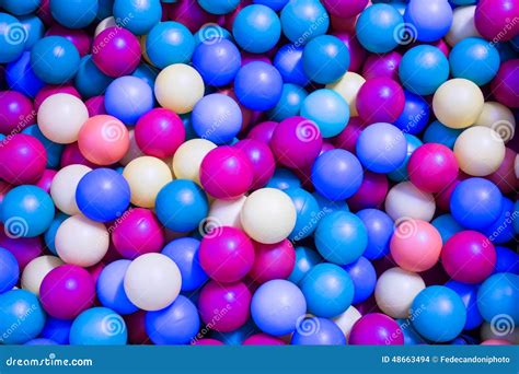 Colored Plastic Balls In The Pool For Children To Play Stock Photo