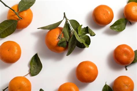 Premium Photo Fresh Mandarine On A White Background Top View Flat Lay