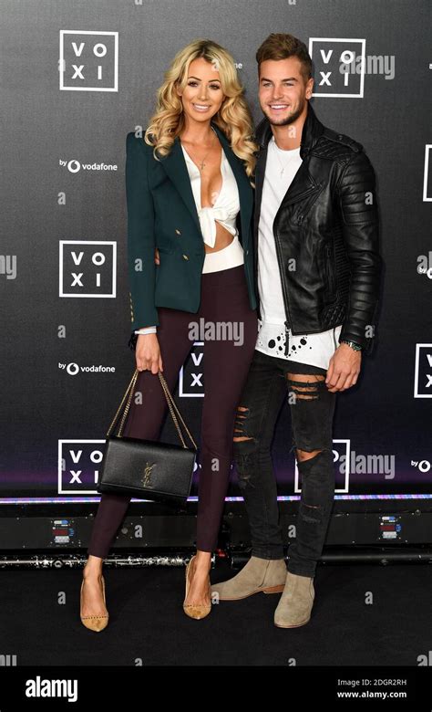 Olivia Attwood and Chris Hughes attending the VOXI launch at Brick Lane Yard, London. Photo ...