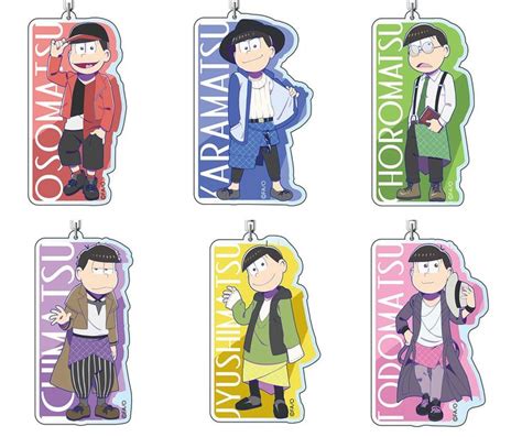 Four Cartoon Characters Are Hanging From Keychains With The Names Of