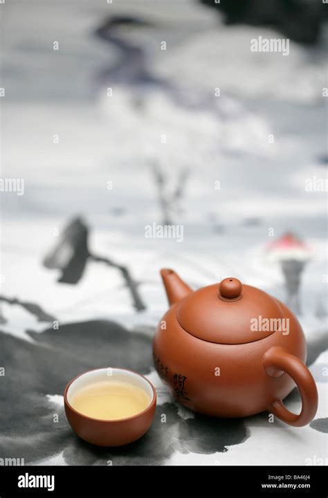 Teapot and cup on Chinese painting Stock Photo - Alamy