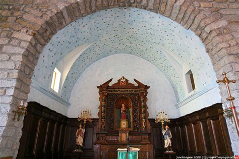 Altar Statue Of Our Lady Of The Snows Lit By Two Wooden Angels Santa