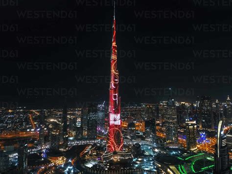 Aerial View Of Illuminated Burj Khalifa Tower At Night In Dubai United