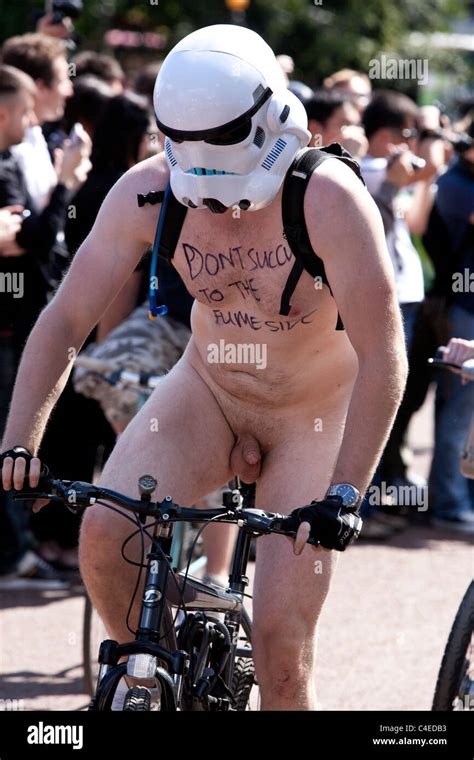 Portrait Of A Naked Cyclist With A Star Wars Stormtrooper Helmet On