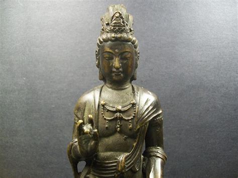 Bidlive A Chinese Mid Qing Dynasty Bronze Standing Guanyin Statue