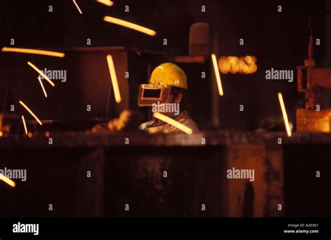 Worker in steel plant Stock Photo - Alamy