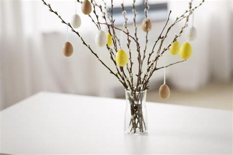 Premium Photo Pussy Willow Branches Decorated By Easter Eggs