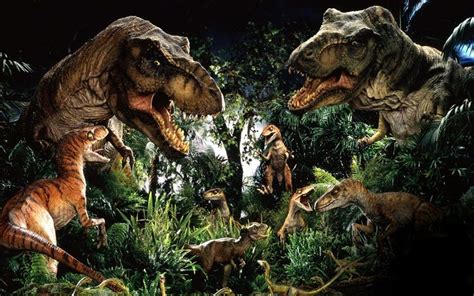 An Image Of Dinosaurs In The Jungle