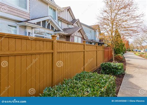 Nice Wooden Fence Around House Wooden Fence With Green Lawn And Trees