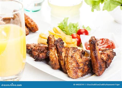 Chicken Wings With Fries French And Spicy Sauce Stock Image Image Of