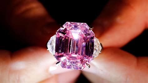 'Pink legacy' diamond sells for $50m at auction | World News | Sky News