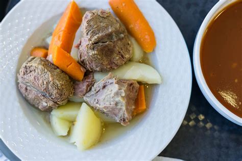 Cooked Beef Meat Potato And Carrot In A White Plate On The Table