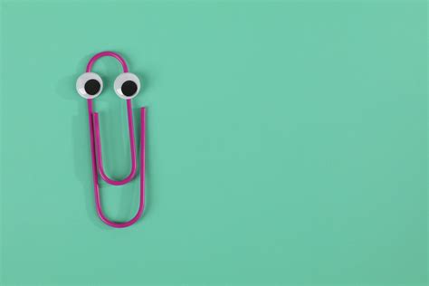 photo  purple paper clip  green background  stock photo