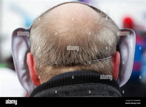 Elderly Man Wearing A Carnival Mask With Big Ears Rear View Düsseldorf Rhineland North Rhine