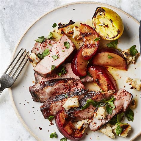 Grilled Pork Chops with Plums, Halloumi, and Lemon Recipe | Epicurious