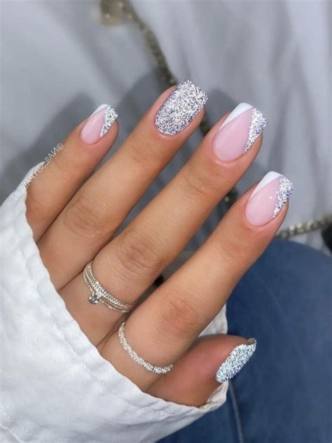 Short White And Silver Glitter Nails With Chevron Tips White Gel Nails