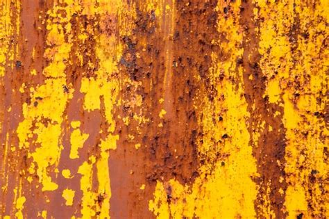 Premium Photo | Rusted yellow painted metal. abstract texture matal ...