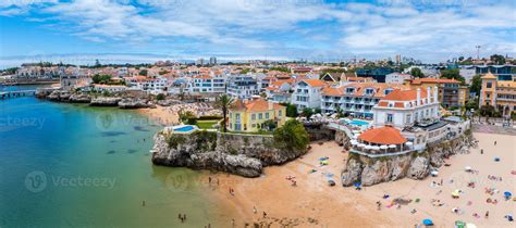 Drone aerial view of Praia da Rainha and historic city centre of