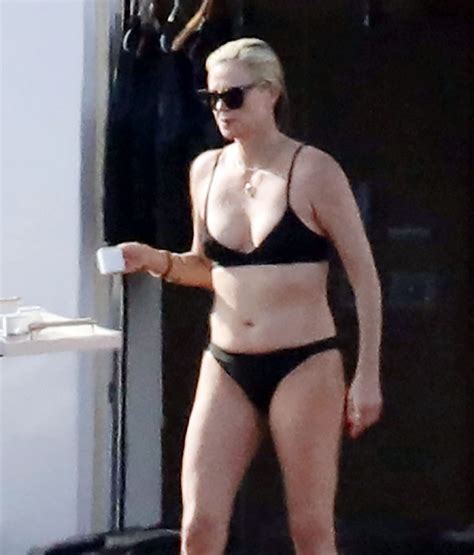 Charlize Theron Showed A Tight Ass In A Bikini While Relaxing On A