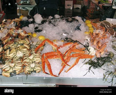 Dpa King Prawns Crabs Hard Clams And Other Seafood Lies On Ice In