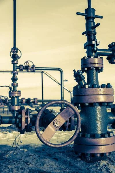 Group Of Wellhead Oilfield With Sand Ground — Stock Photo © Bashta