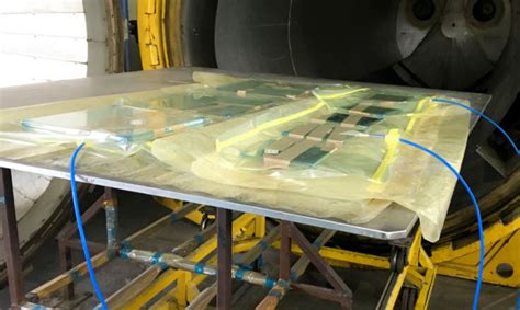 SolarWindow's electricity-generating glass achieves processing ...