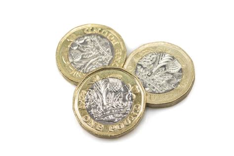 Three British One Pound Coins On White Stock Photo Image Of Exchange