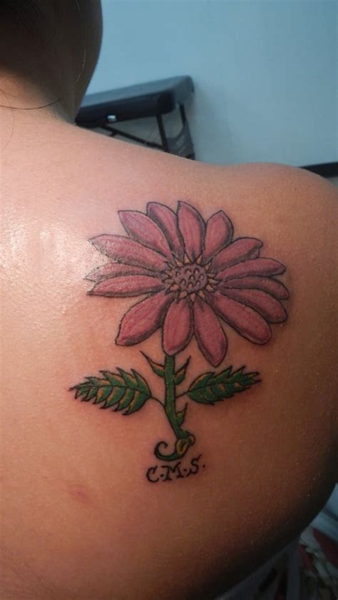 65 Daisy Tattoo Designs for flower lovers