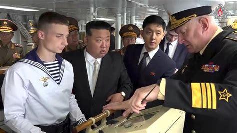 North Korea's Kim Jong Un Inspects Russian Bombers and a Warship on a ...