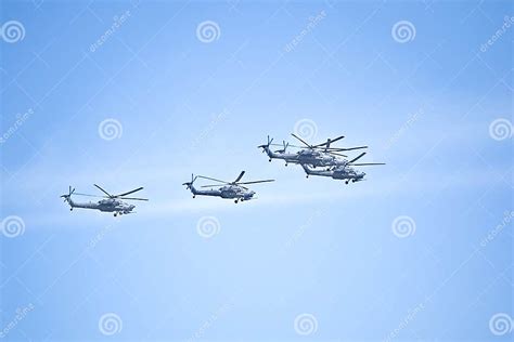 Fighters Flying Helicopters At The Victory Day Military Parade Stock