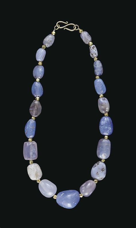 A Western Asiatic Blue Chalcedony Bead Necklace Circa 2nd Century Bc