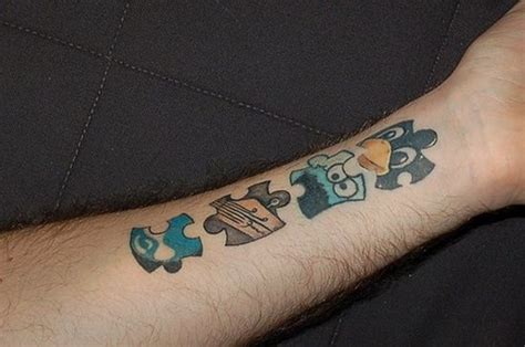 The Matching Puzzle Tattoo Designs And Meaning On Arm Puzzle Tattoos