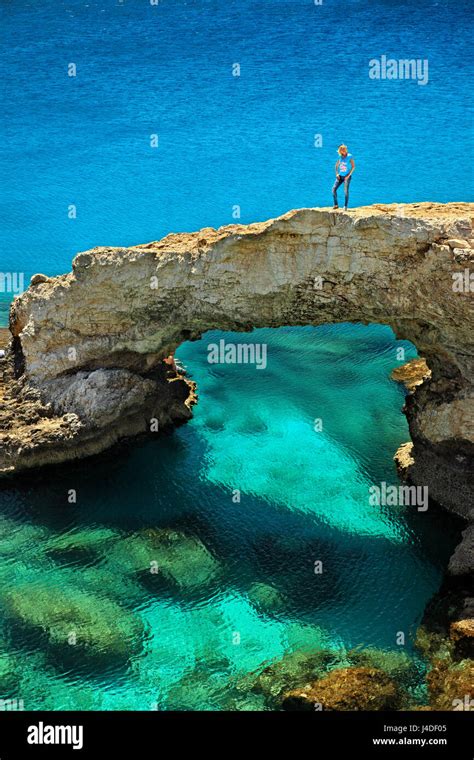 Natural Rocky Arch Known As The Bridge Of Love At Cavo Greco Very