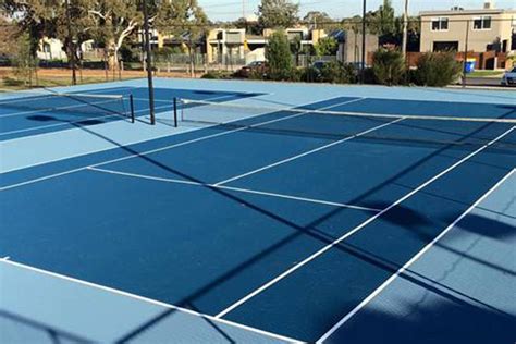 blue-tennis-courts-at-melbourne-school - ASTE