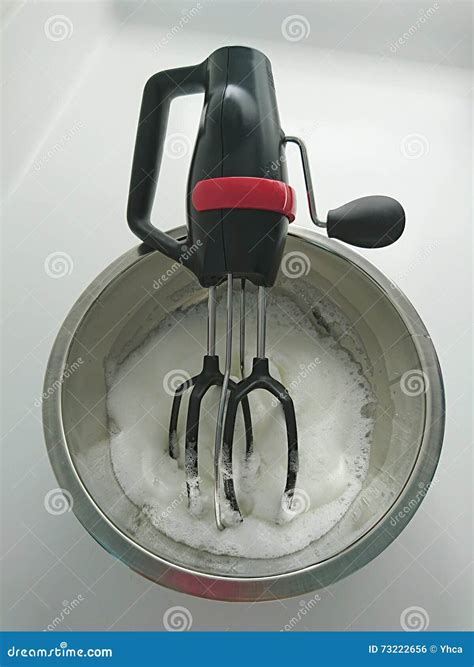 Whisking egg whites stock photo. Image of metal, meringue - 73222656