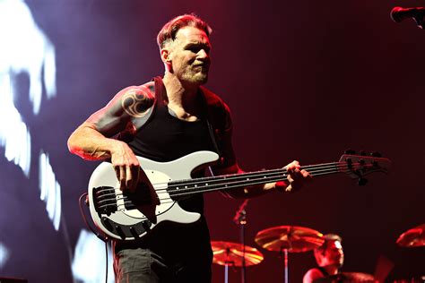 Rage Against the Machine Bassist Reveals Cancer Battle | DRGNews